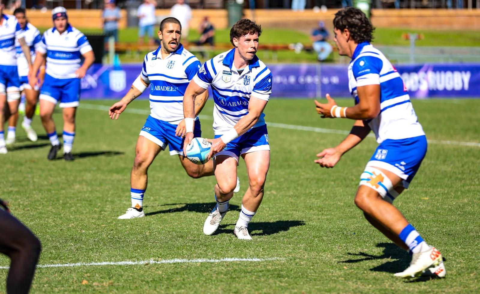 Tom Price passing the ball during a competitive match