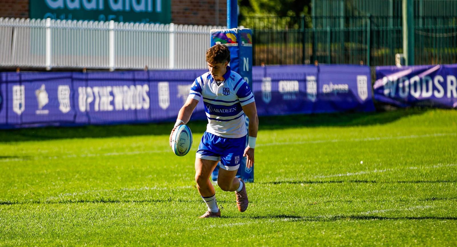 Tom Price carrying the ball in open field