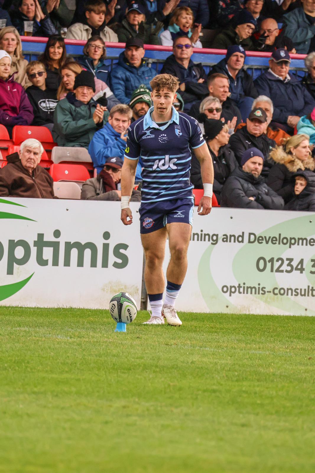 Tom Price preparing for a kick in front of the crowd